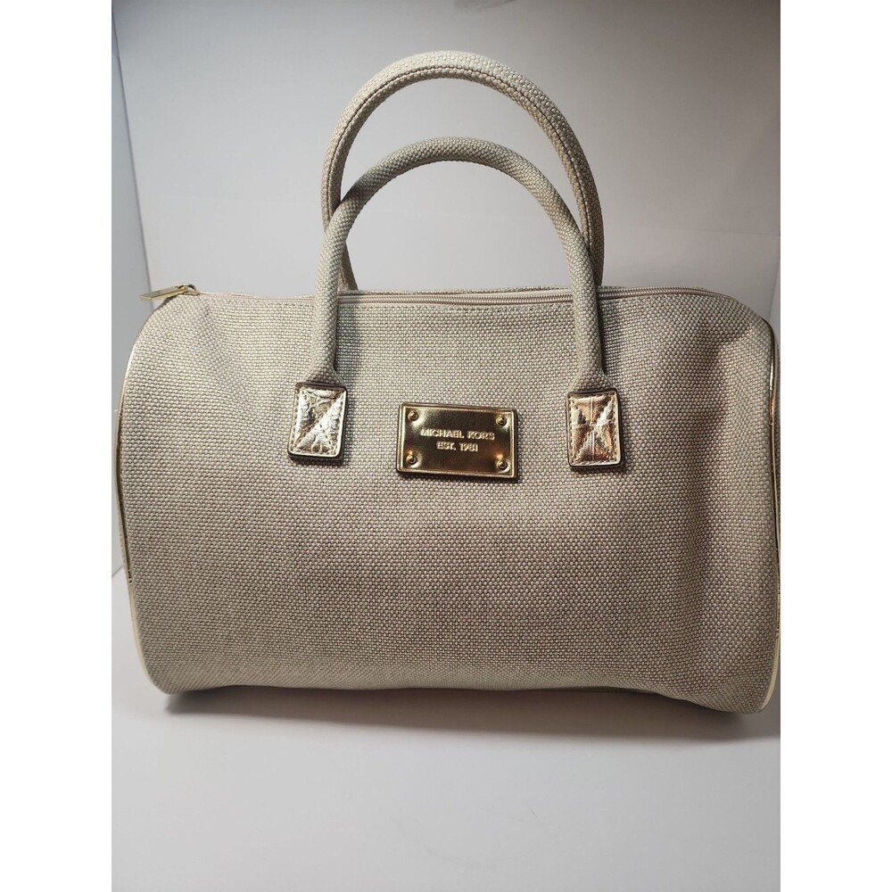 Michael Kors Tan Satchel with Gold Hardware.  Great condition.